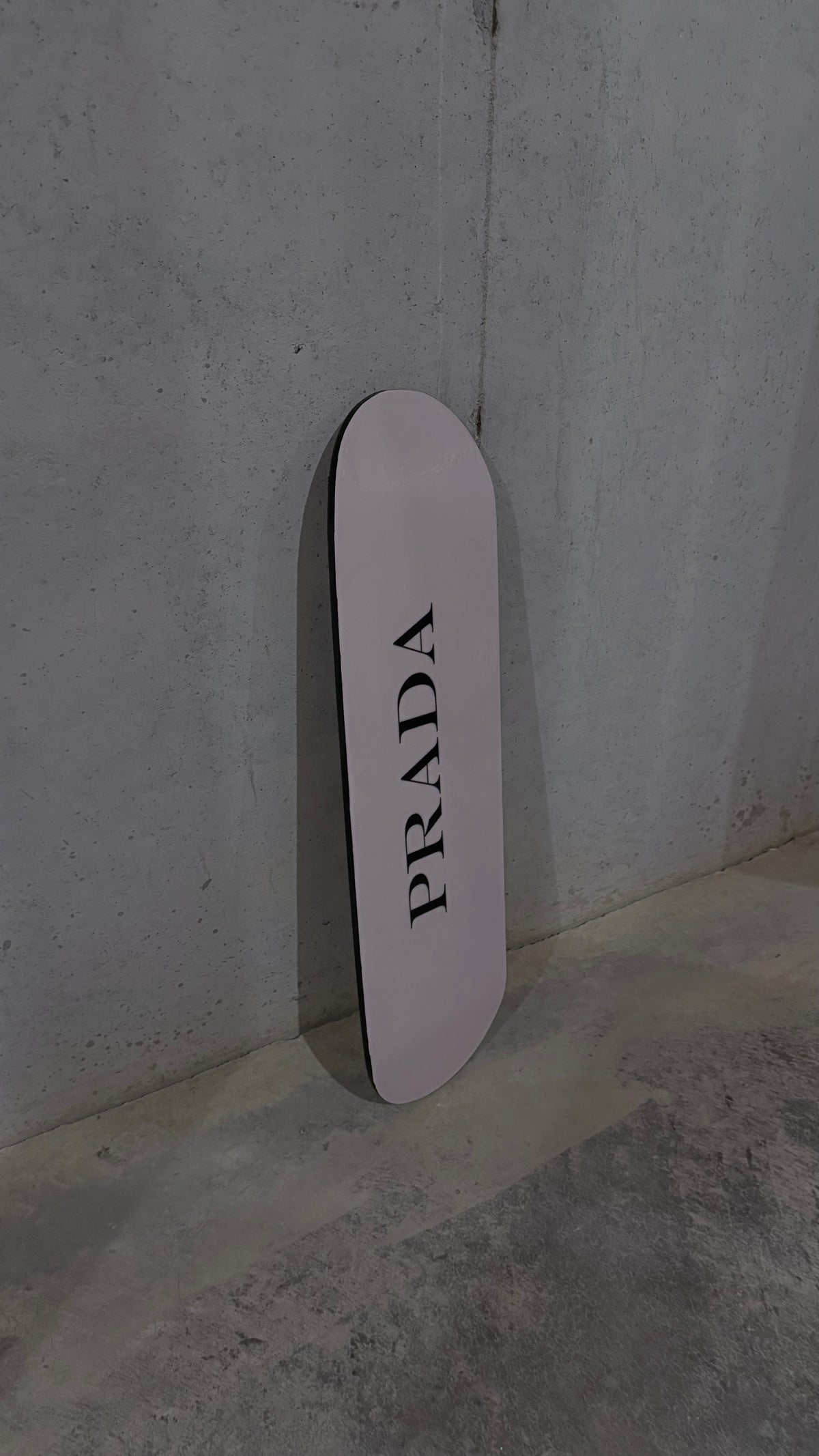 pink and black skateboard deck