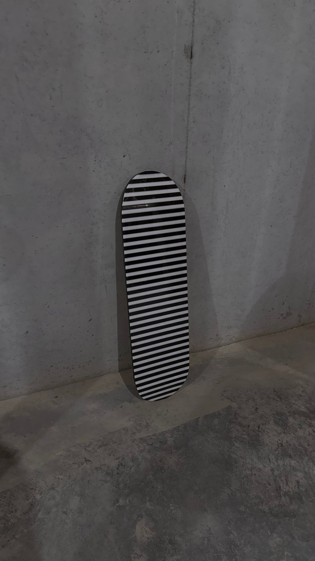 black and white striped skateboard deck