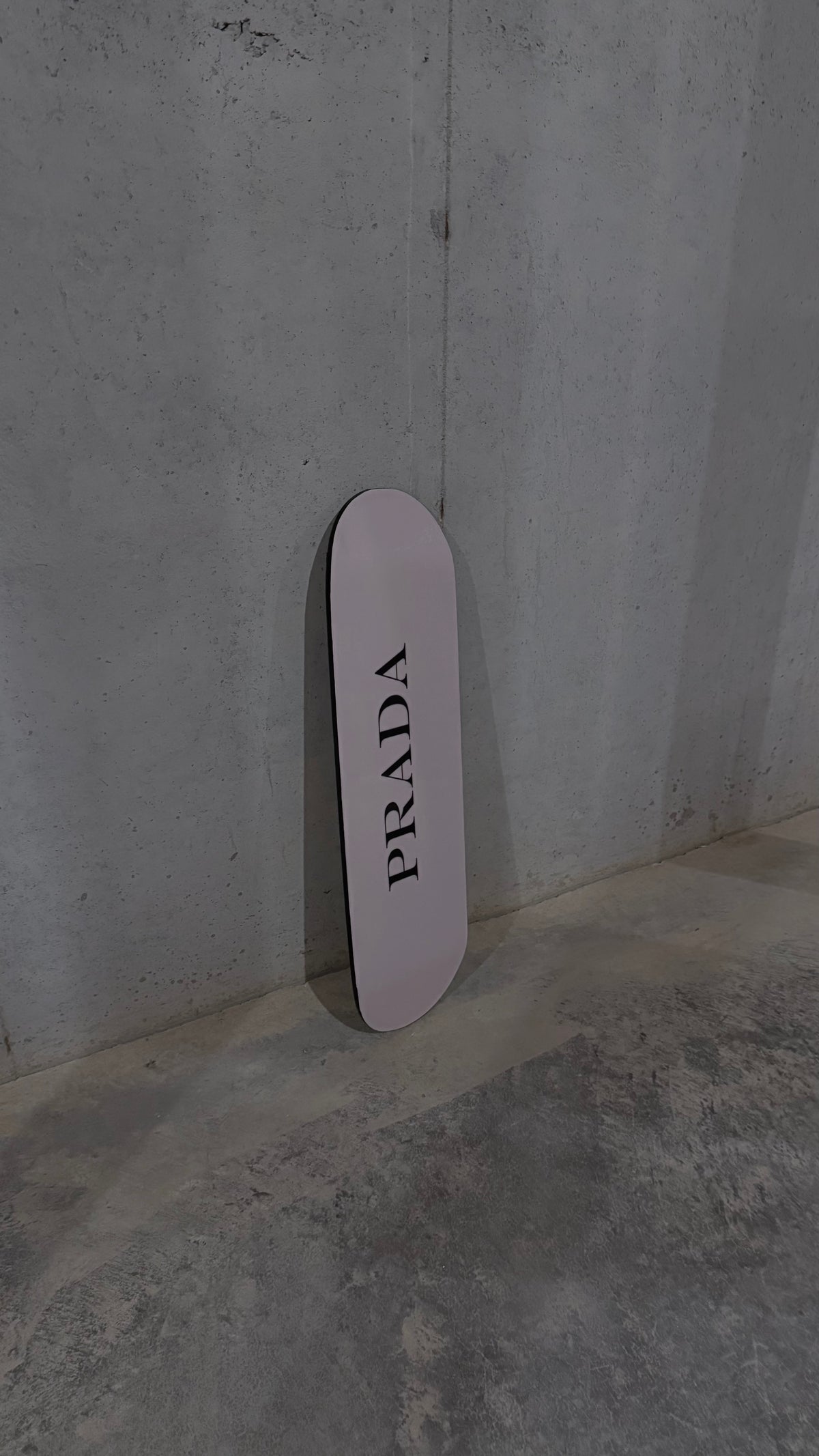 pink and black skateboard deck