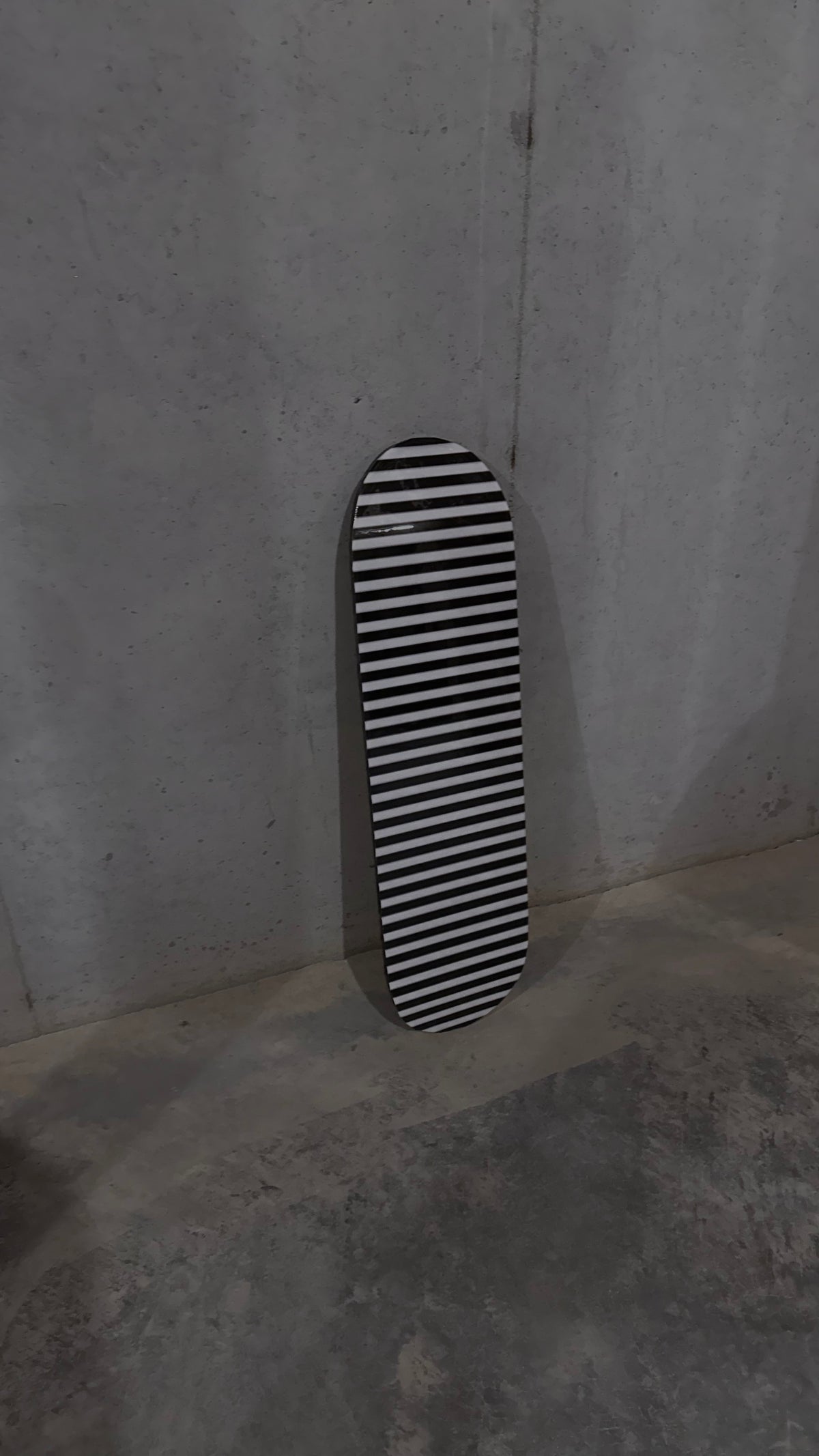 black and white striped skateboard deck