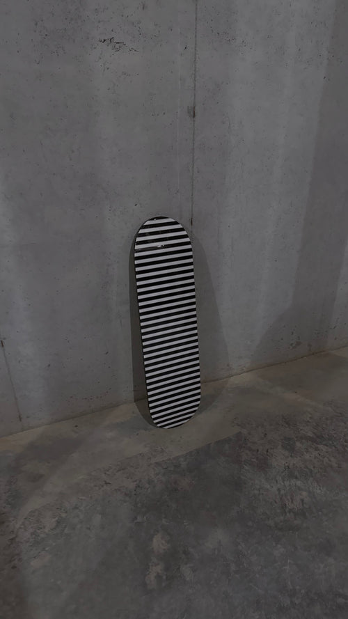 black and white striped skateboard deck